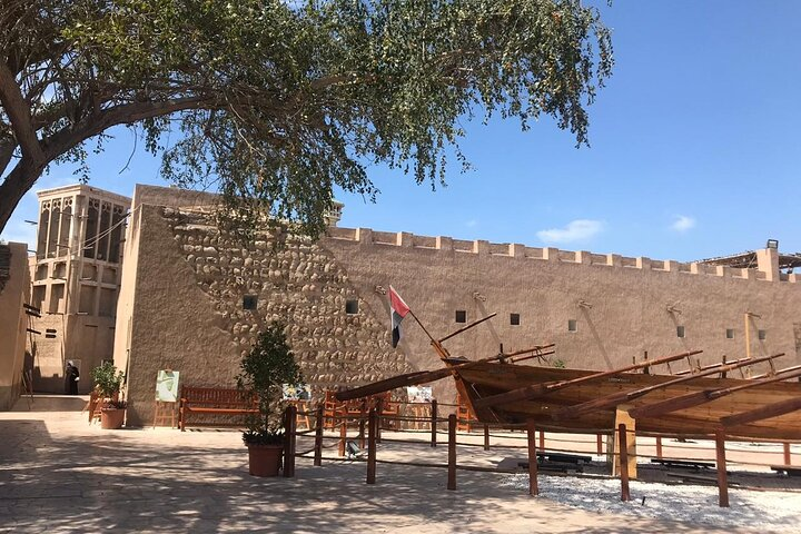 Explore the charm of Dubai's Old Town where you’ll connect with locals savor traditional dishes and experience authentic hospitality in their historic homes. A true cultural delight awaits!